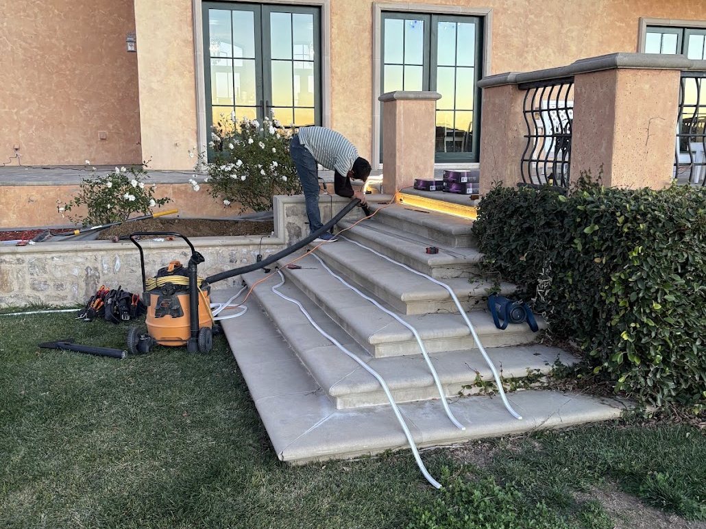 Cable runs laid out at the steps during installation