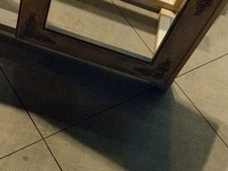 Carved table end cut down ready to be reused