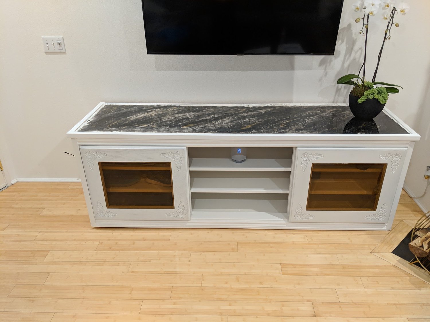 Media console built from two old carved coffee tables